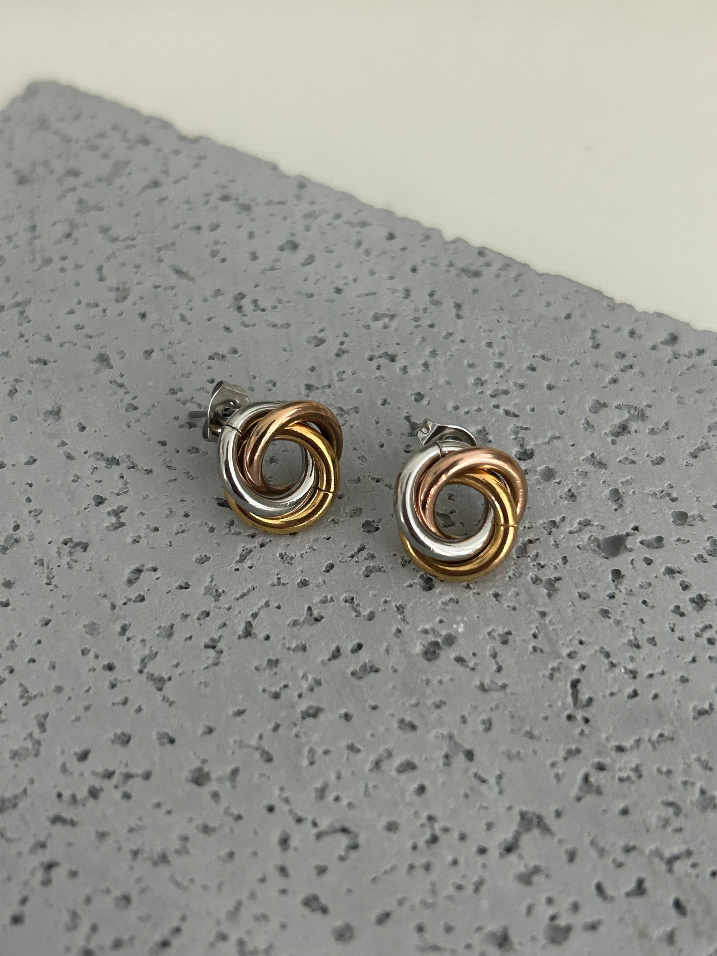 Risla earrings • Three tone Intertwined circle Studs