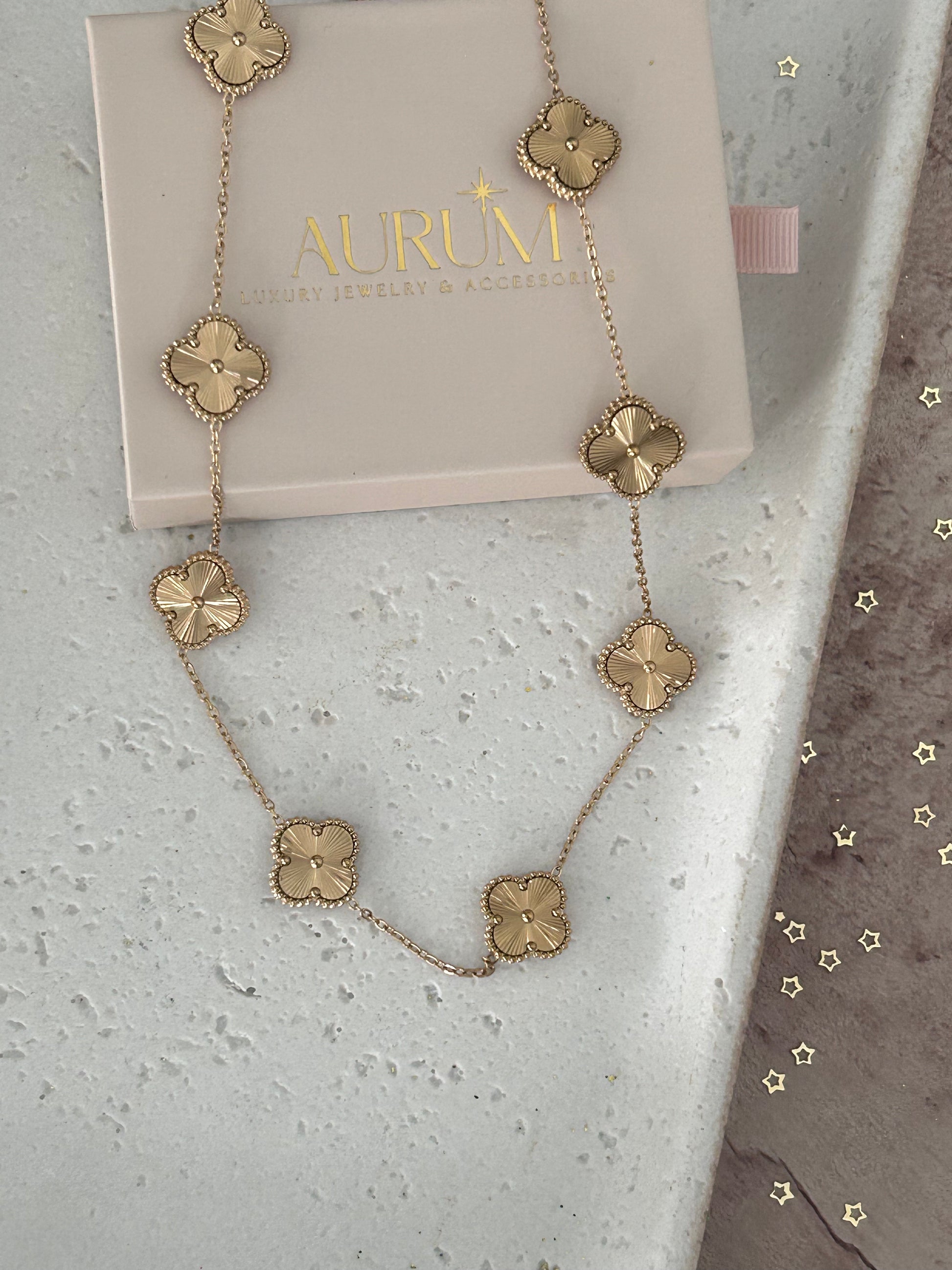 18K gold-plated All over gold Clover Necklace. waterproof, hypoallergenic, and chic.