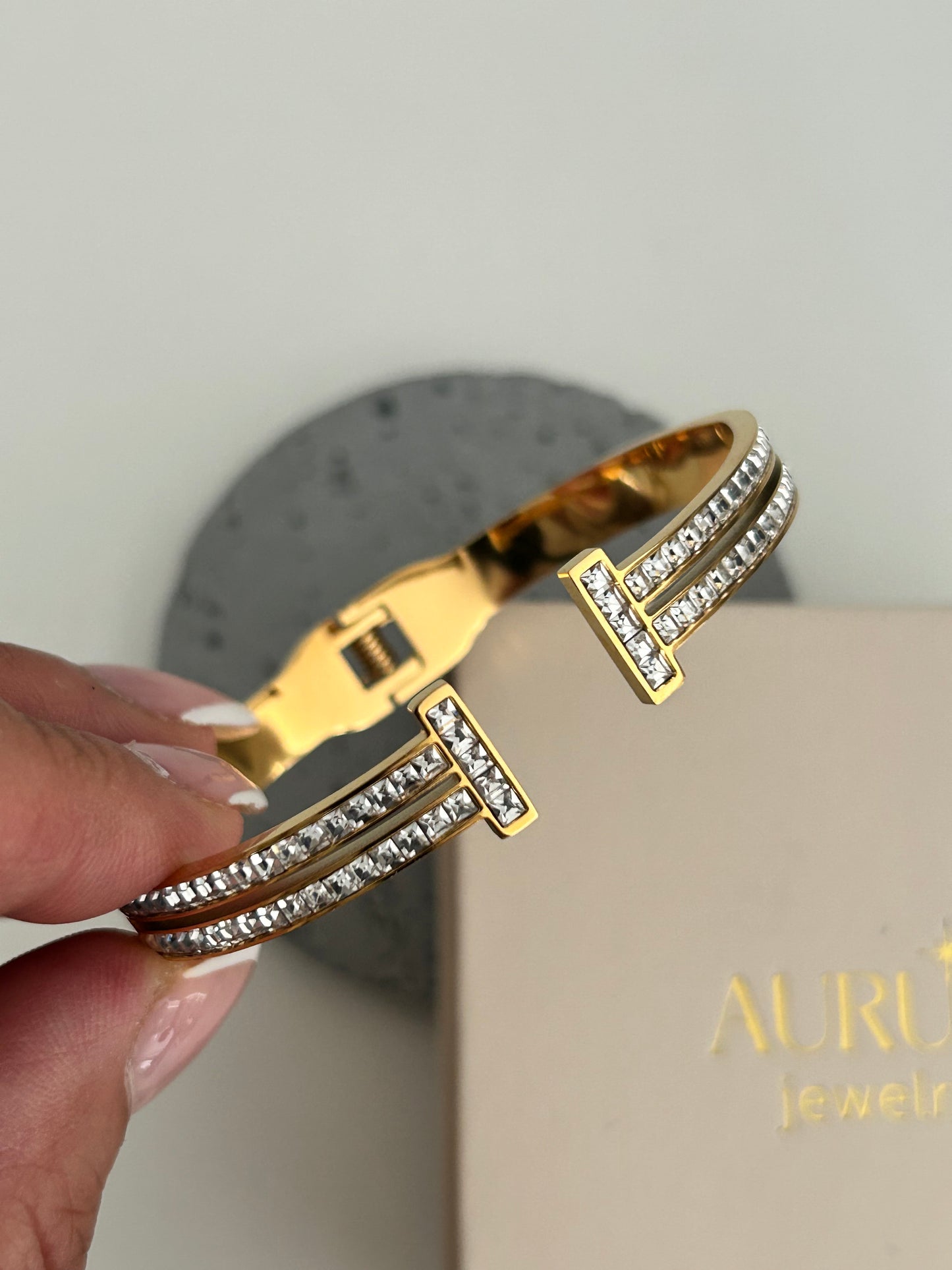 Stella bangle •  T Rhinestone bangle