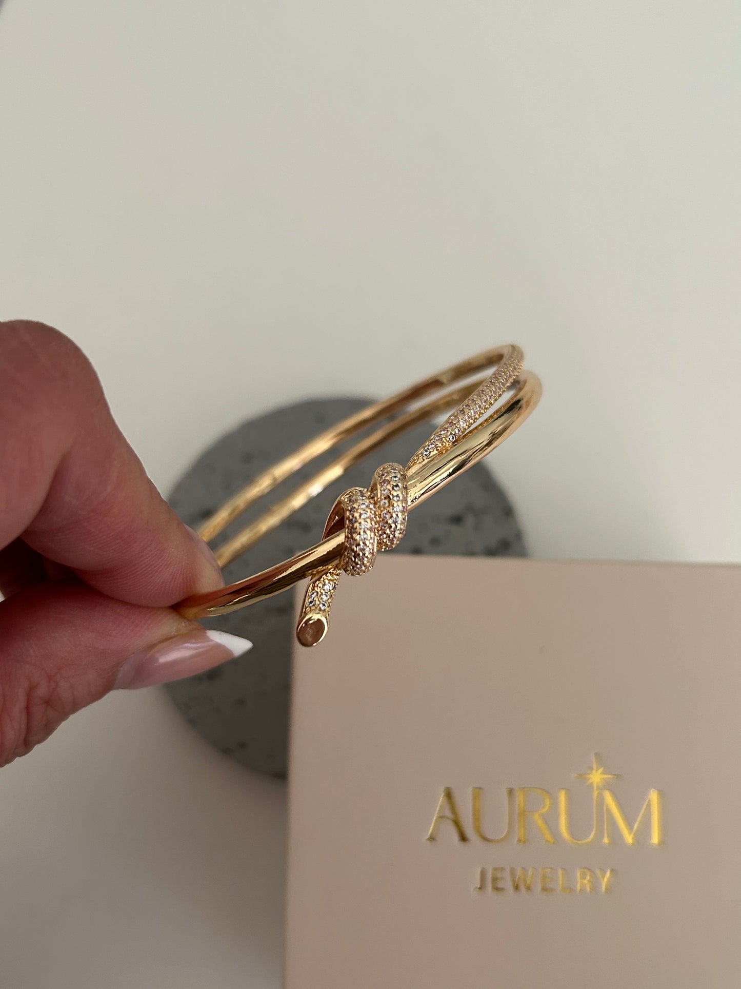 Gold Crystal knot Bangle