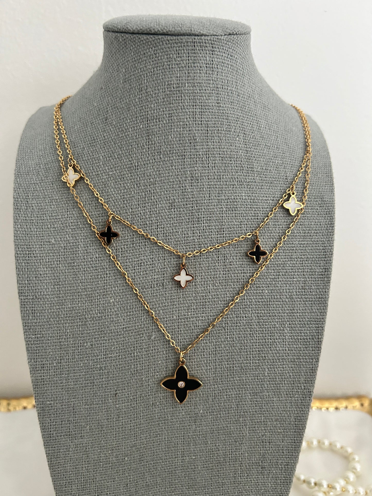 Amara necklace • Double layered mother of pearl  and black four petal flower necklace