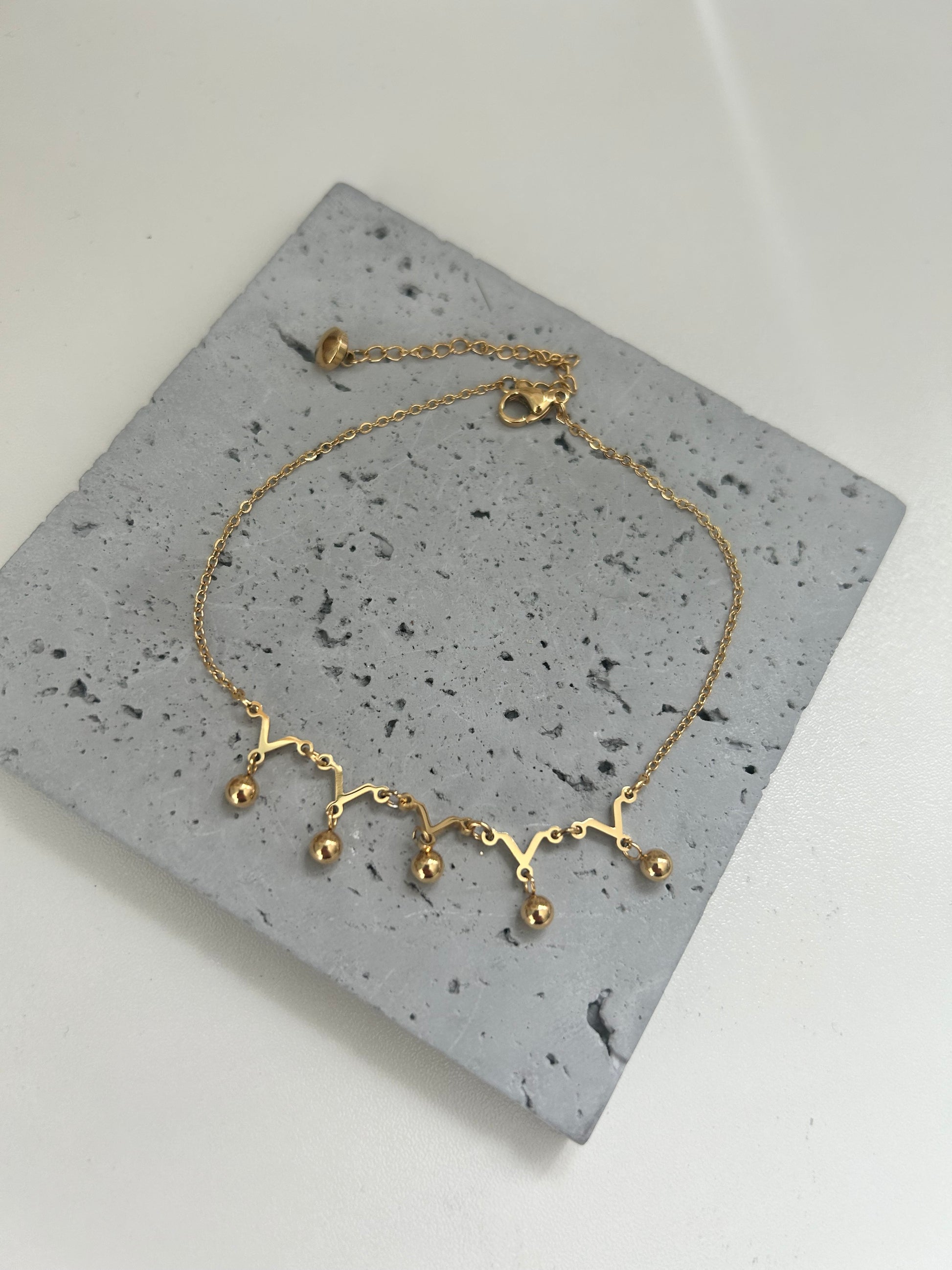 Gold charm anklet