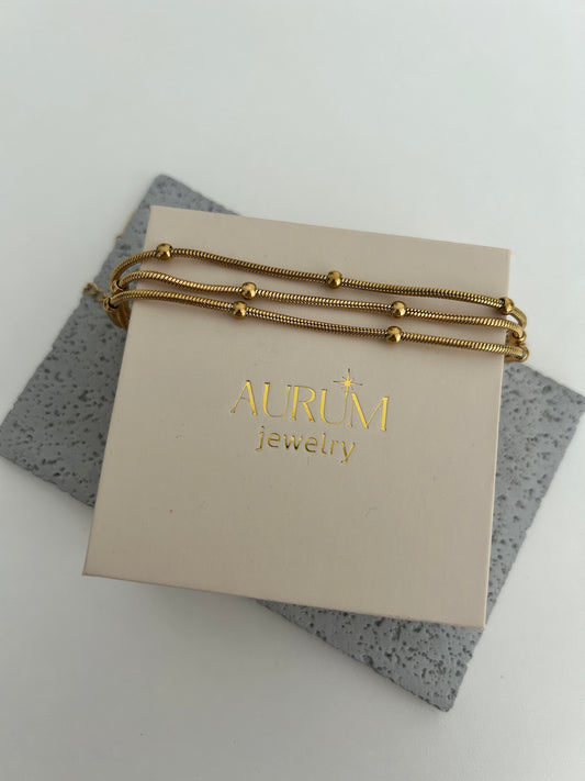 Aira Three-Strands Gold Beaded Bracelet